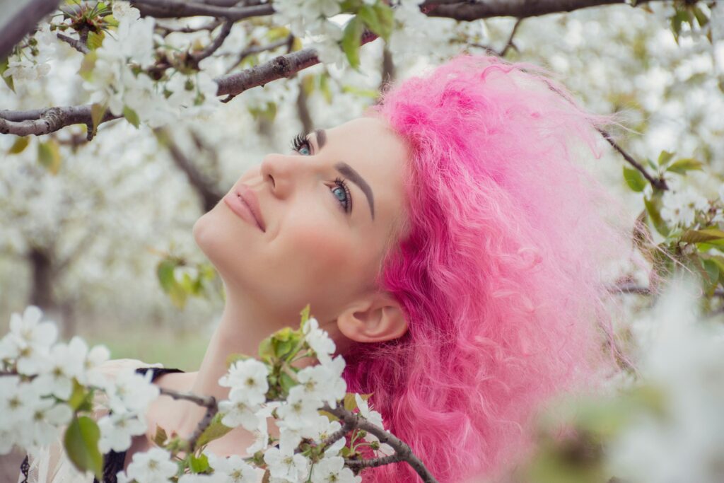 Hair colouring. Woman in pink hair